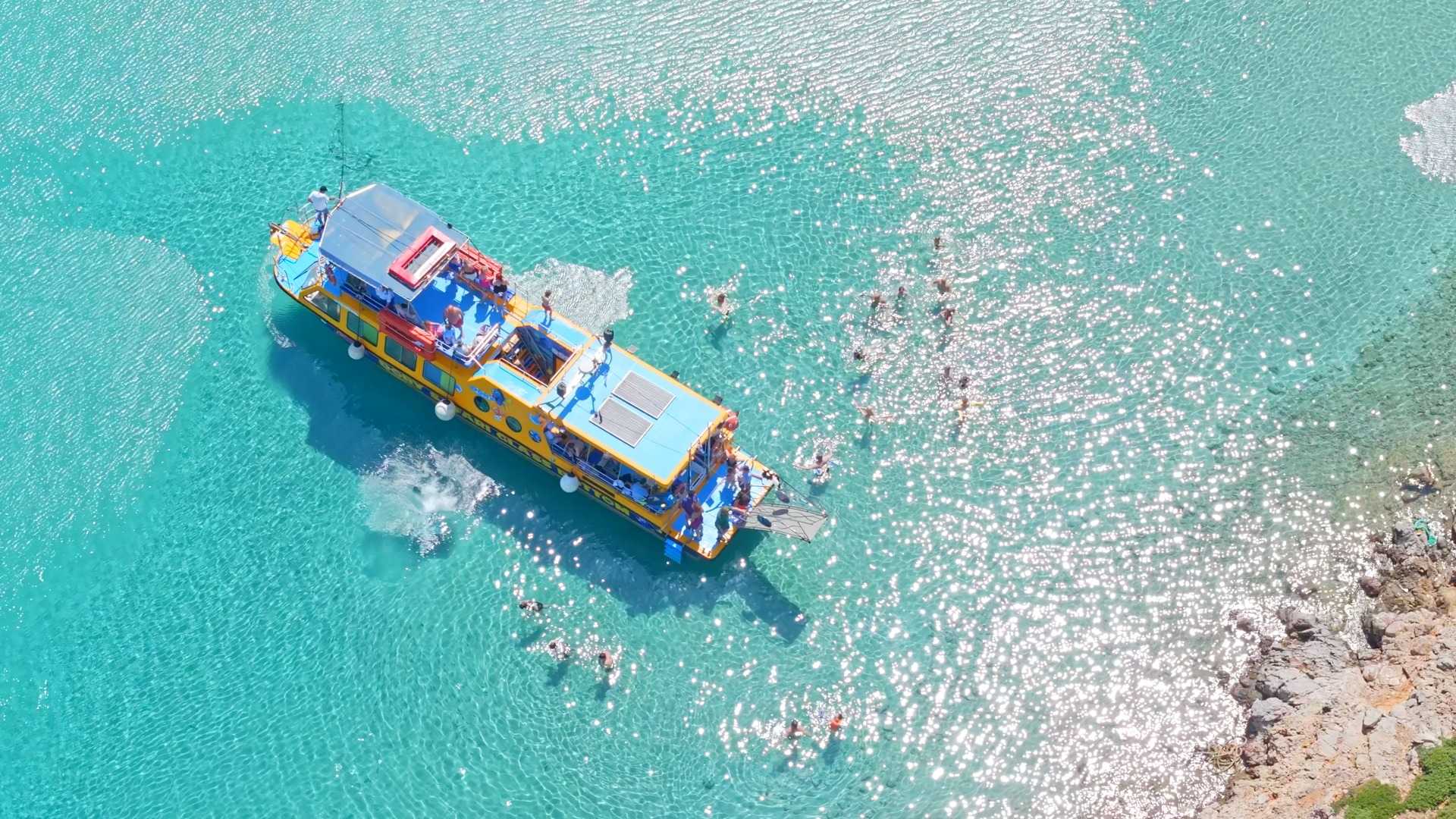 Dory’s Trip: A Glass-Bottom Boat Cruise with Swimming Stops