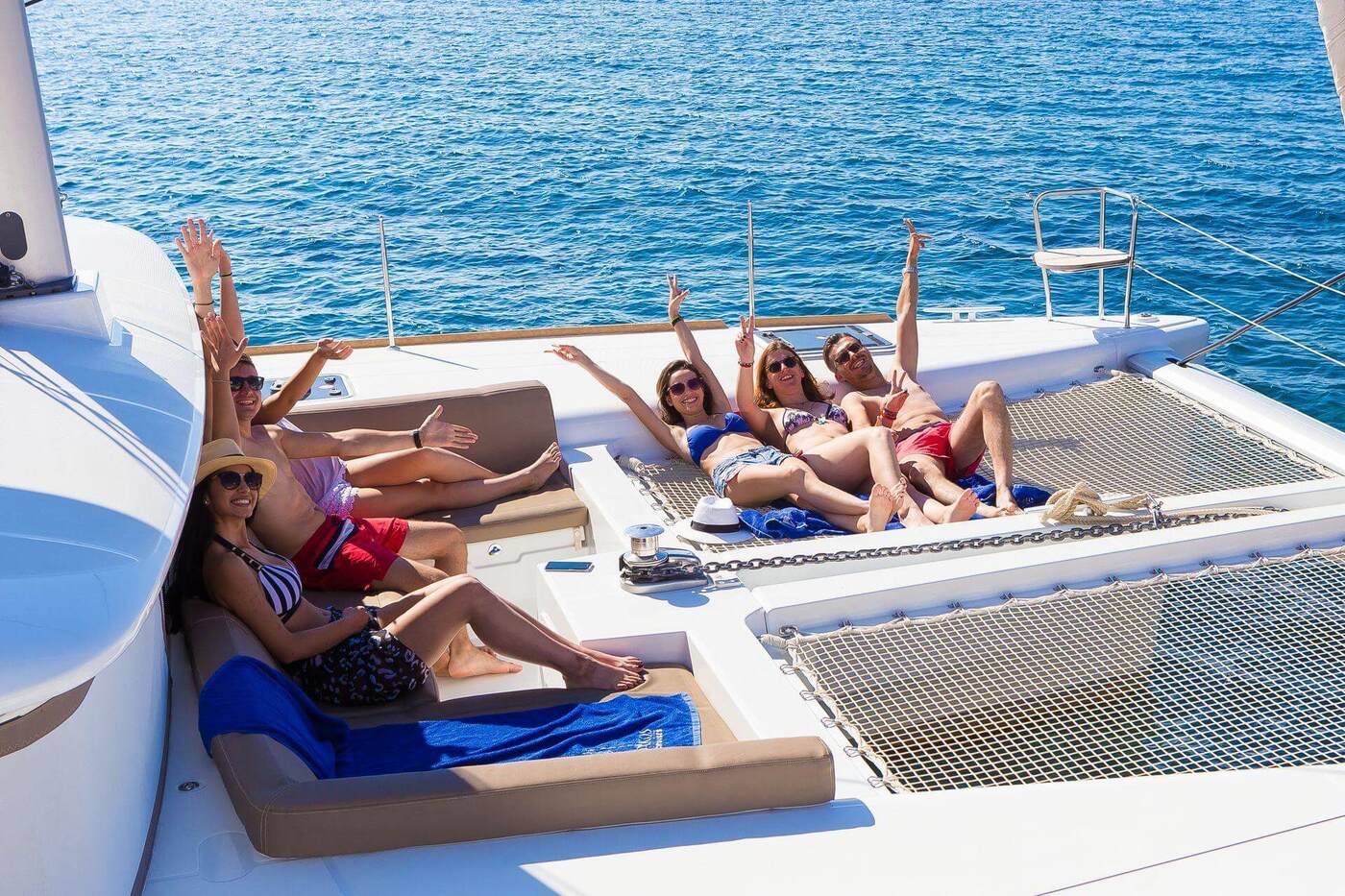 Private Catamaran Full Day Cruise with BBQ, Open Bar & Transfers