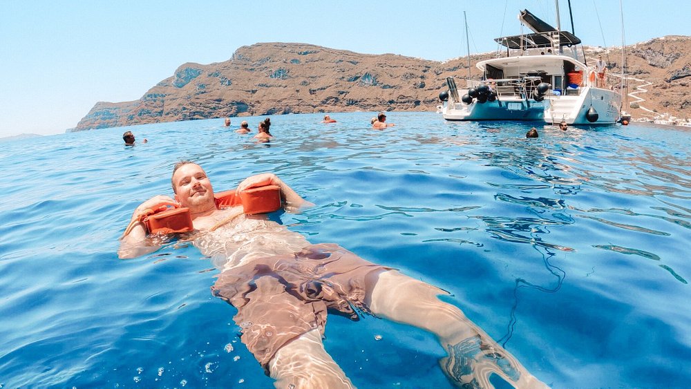 Catamaran Semi-Private Daytime Standard Cruise with BBQ, Drinks & Transfers