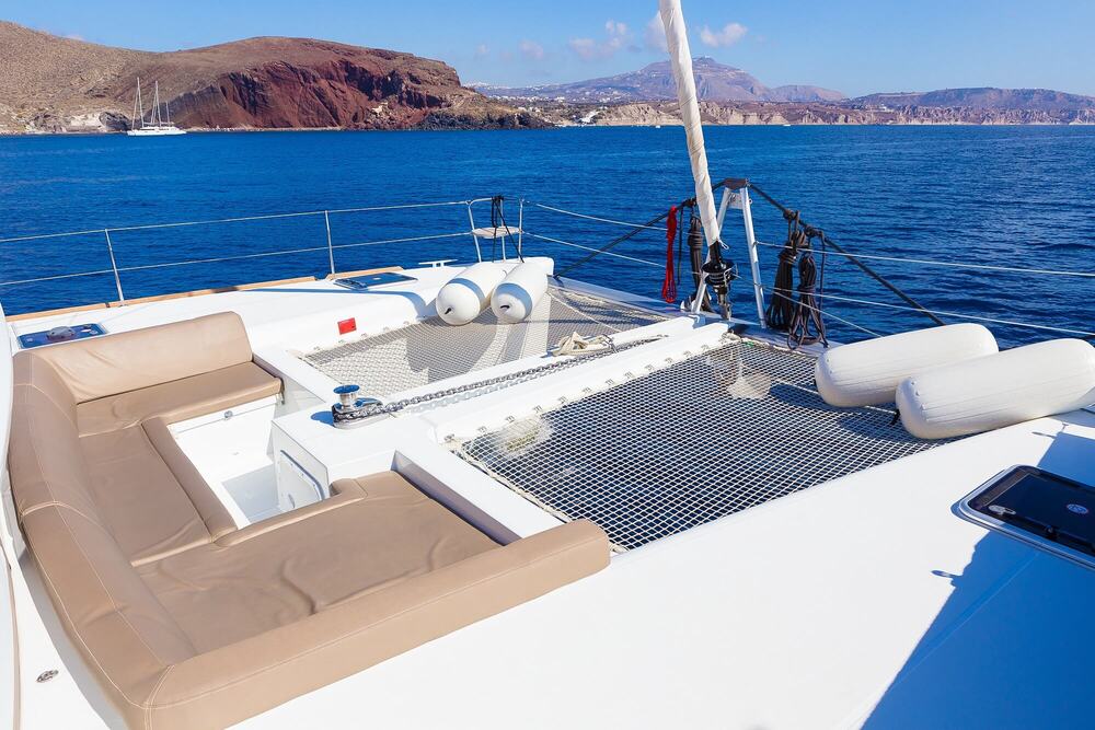 Private Catamaran Full Day Cruise with BBQ, Open Bar & Transfers