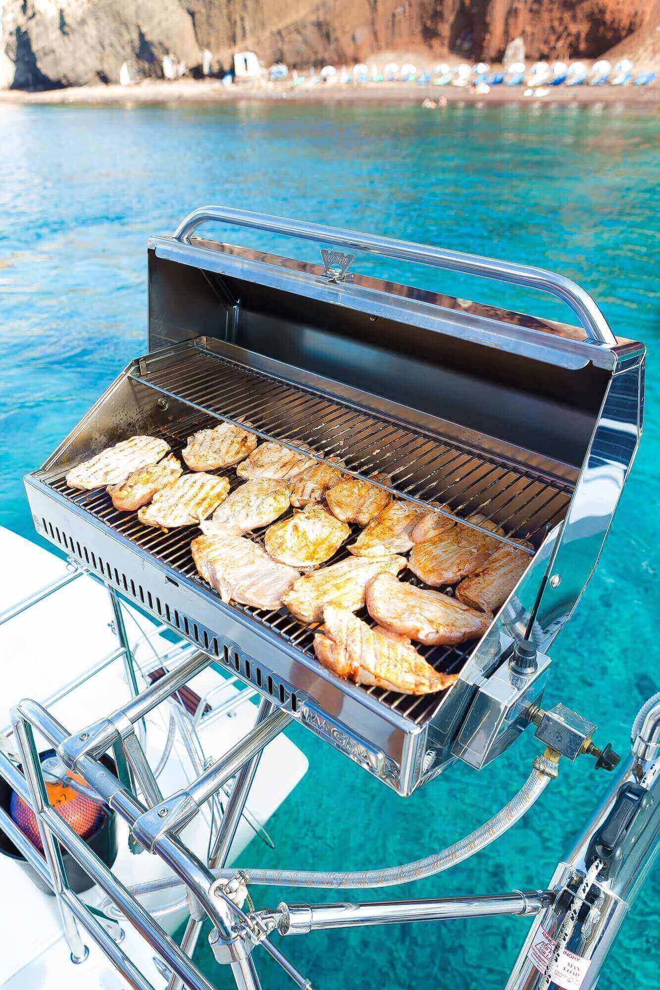 Private Catamaran Full Day Cruise with BBQ, Open Bar & Transfers