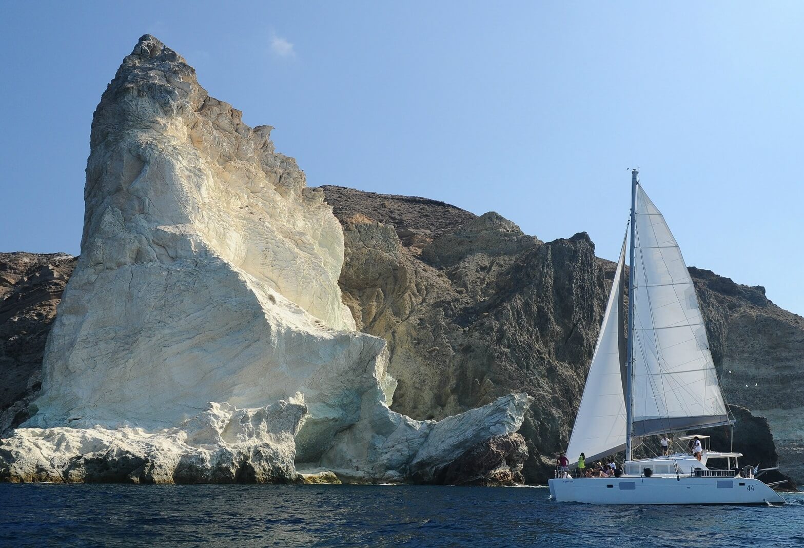 Private Catamaran Full Day Cruise with BBQ, Open Bar & Transfers