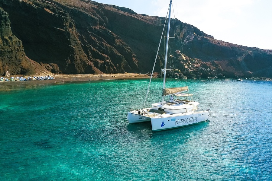 Private Catamaran Full Day Cruise with BBQ, Open Bar & Transfers