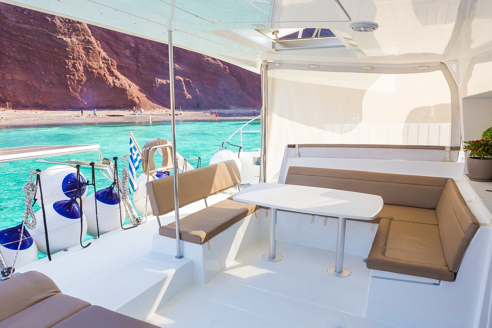 Private Catamaran Full Day Cruise with BBQ, Open Bar & Transfers